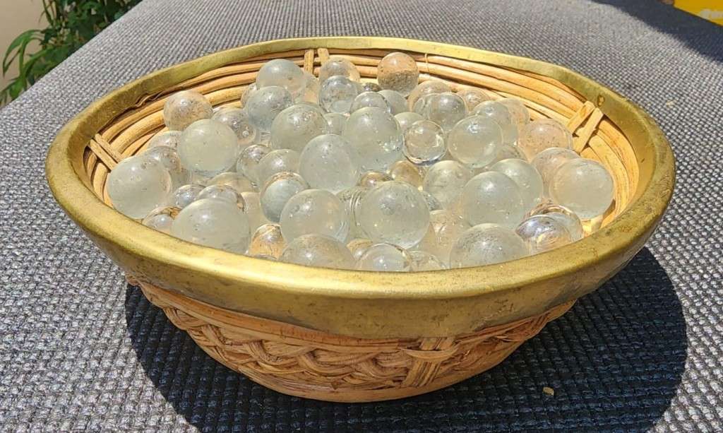 Glass WEAVED BOWL WITH BRASS RIM FILLED WITH GLASS MARBLES for sale
